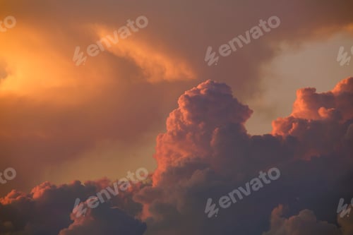 Preview: White fluffy cumulonimbus clouds forming before thunderstorm on evening sky