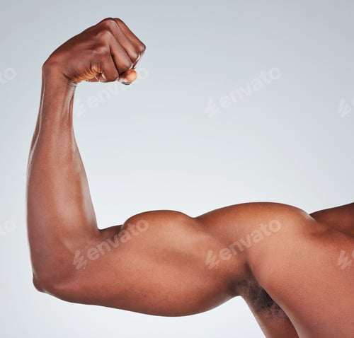Preview: Closeup of one unrecognizable African American fitness model posing topless in and looking muscular