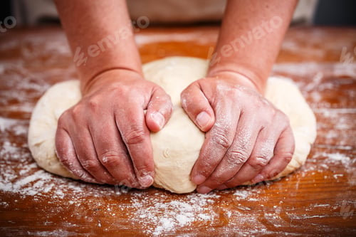 Preview: Female hands preparing dough