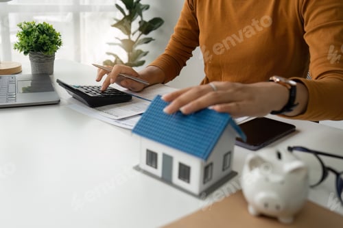 Preview: Asian accounting professional calculating household bills, reviewing and analyzing household bills