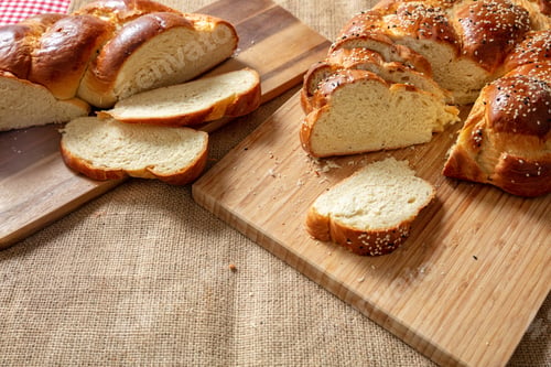 Preview: Easter sweet bread, greek tsoureki, brioche braid slice on table, close up view