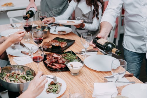 Preview: * Festive table: meat dishes, sauces and white wine. Tableful.