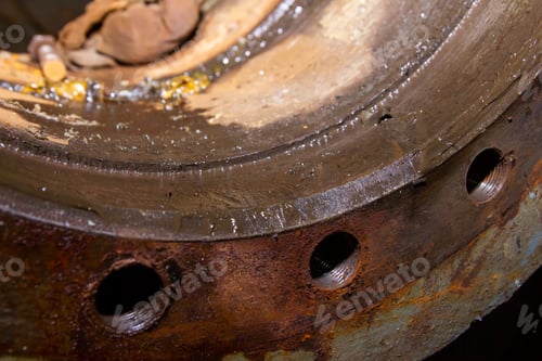 Preview: Closeup of a rustic metal flange corrosion