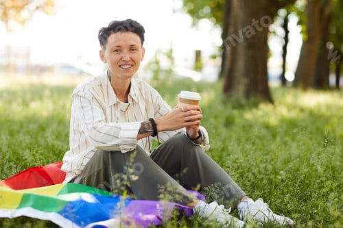 Preview: Woman with coffee outdoors