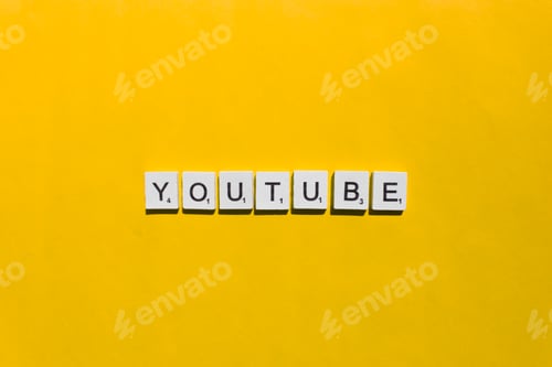 Preview: YouTube scrabble letters word on a yellow background