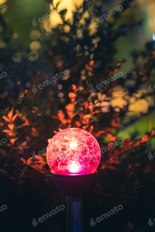 Preview: Night View Of Flowerbed Illuminated By Energy-Saving Solar Powered Colorful Multi-colored Lantern On