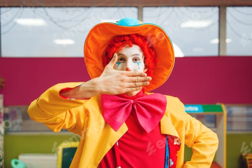 Preview: Funny clown shows tricks with facial expressions