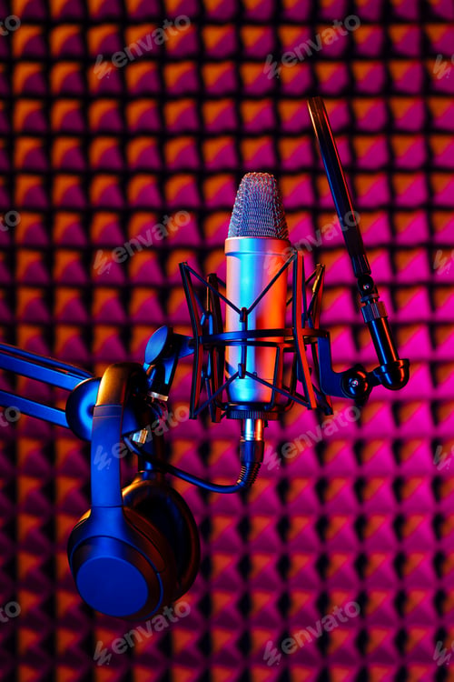Preview: Professional studio microphone against acoustic foam panel background in neon light