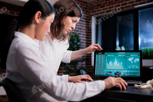 Preview: Marketing agency employees discussing about bankruptcy while analyzing financial data on laptop