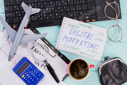 Preview: Digital marketing on notepad and various office supplies