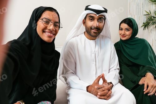 Preview: Emirati friends celebrating at home taking selfie