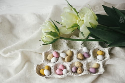 Easter Candy and Tulips on White Linen