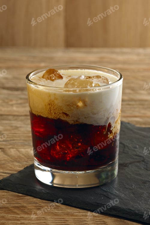 Preview: Cocktail White Russian. Vodka, coffee liquor, cream and ice