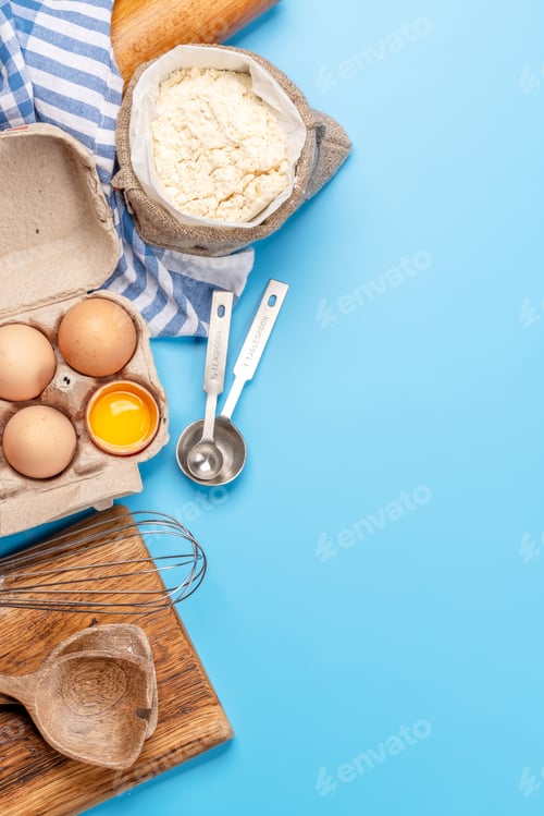 Preview: Cooking ingredients and utensils on blue background