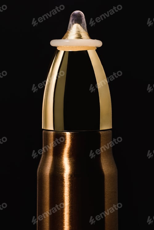 Preview: Make love, not war. Pacifism and non-violence movement. Bullet with a condom on the top.