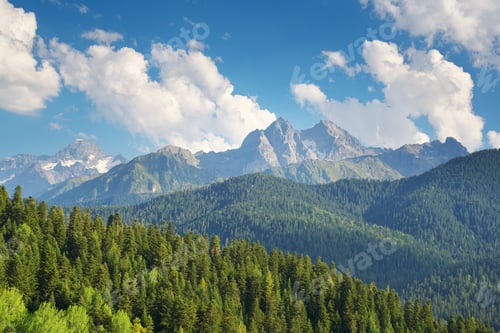 Preview: Nature landscape scene of mountain range and blue sky with clouds at day