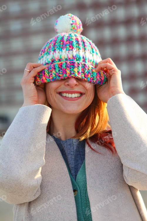 Preview: Joyful Young Redhead Woman Outside