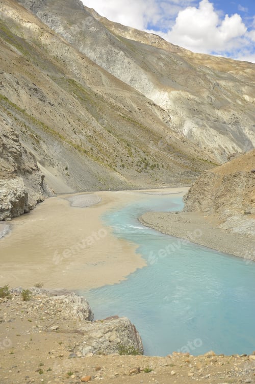 Preview: Conjunction of the Zanskar and Indus rivers flowing in between beautiful dry mountains