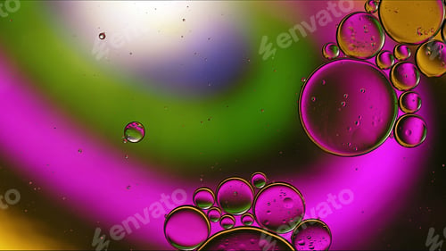 Preview: Abstract Colorful Food Oil Drops Bubbles and spheres Flowing on Water Surface