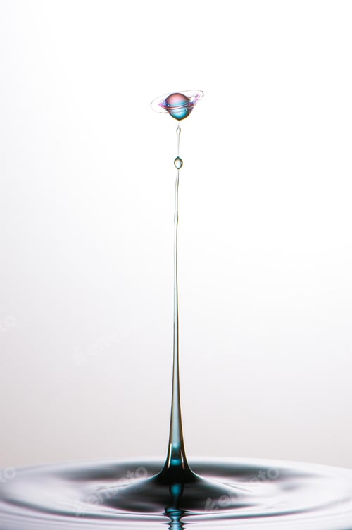 Preview: Splash of colorful liquid with high speed flash