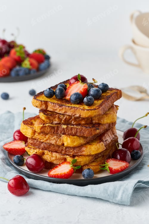 Preview: French toasts with berries, brioche breakfast, white background, vertical closeup