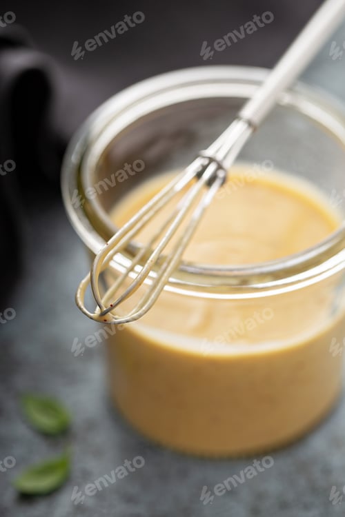 Preview: Homemade honey mustard sauce in a glass jar