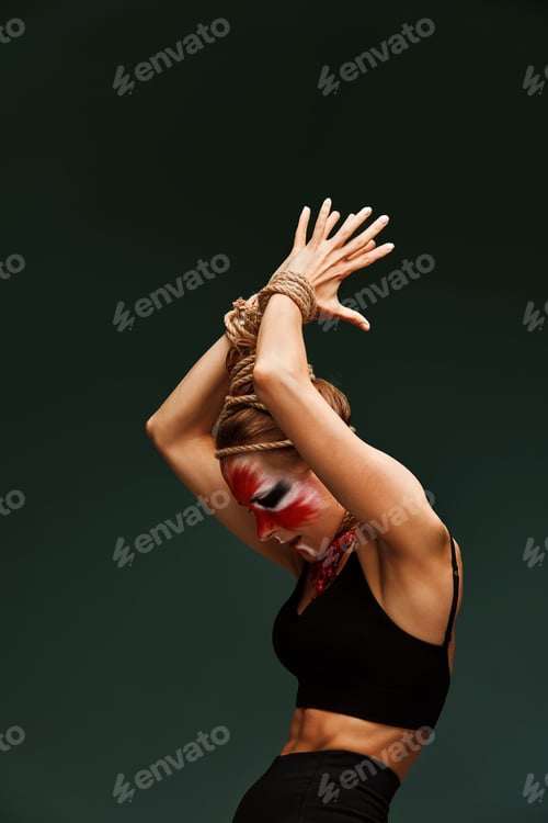 Preview: fashion portrait of pretty young woman with creative make up like a animal, fashion victim. Animal
