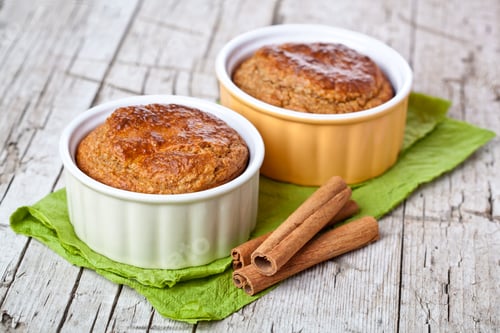Preview: two fresh baked buns and cinnamon sticks
