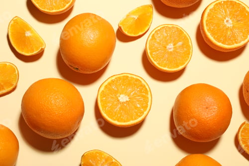 Preview: Fresh ripe oranges on beige background, flat lay