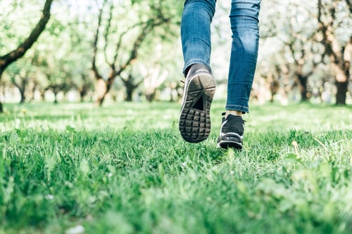 Preview: Woman running in the park