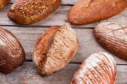 Preview: Natural organic bread assortment on wooden background.