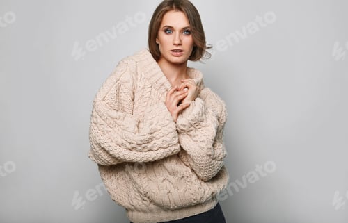 Preview: Portrait Of Beautiful Blond Woman In Woolen Sweater