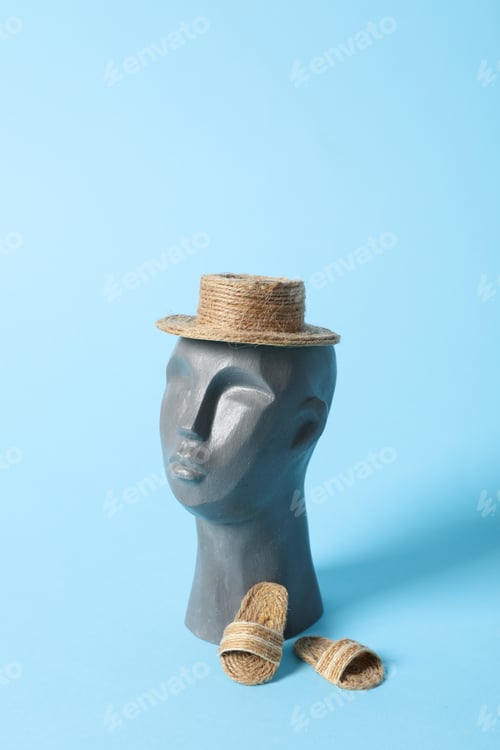 Preview: Vacation concept with decorative head on blue background