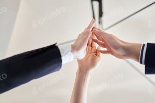 Preview: Asian business person with high five