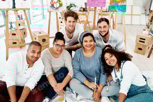Preview: Cropped portrait of a diverse group of friends posing together during an art class in the studio