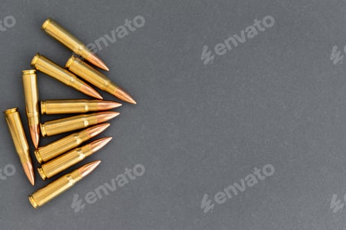 Preview: Ammunition on a Gray Surface with Copy Space