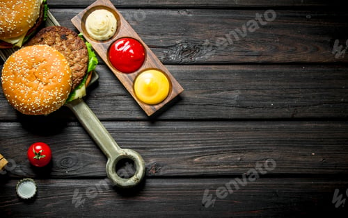 Preview: Burgers with beef and sauces.