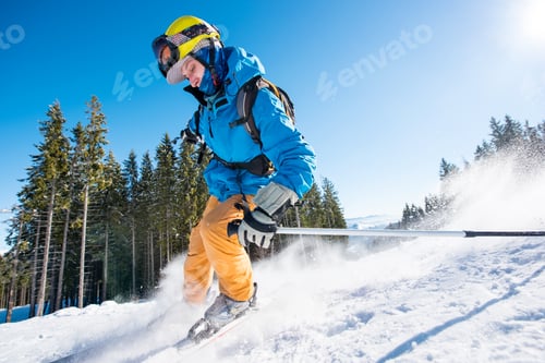 Preview: Skier skiing in the mountains