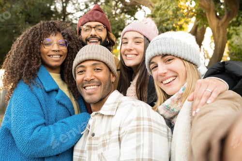Preview: Big group of cheerful young friends taking selfie portrait. Happy people looking at camera smiling.