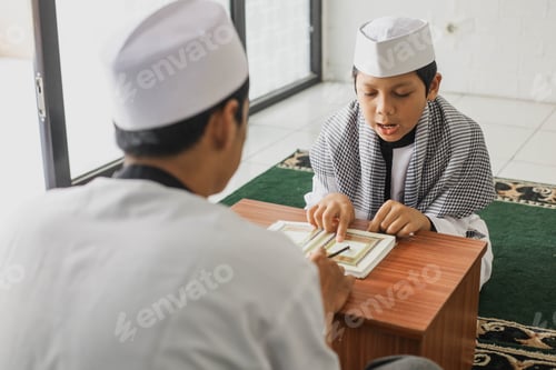 Preview: Muslim boy studying Quran