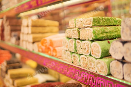 Preview: turkish delight on display at a market in the evening sunlight