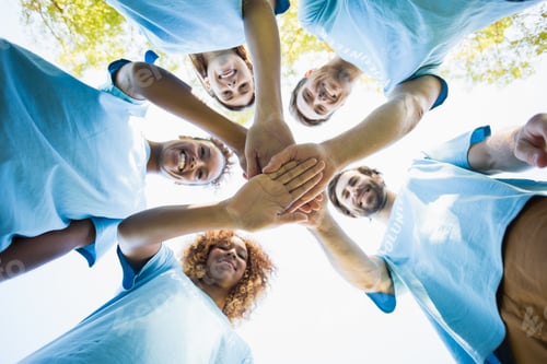 Preview: Group of volunteer forming huddles