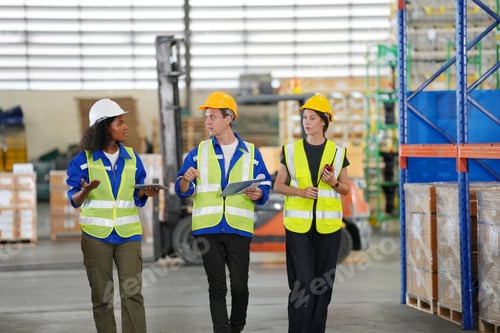 Preview: Young warehouse workers working together. Business distribution supply and logistic shipment.