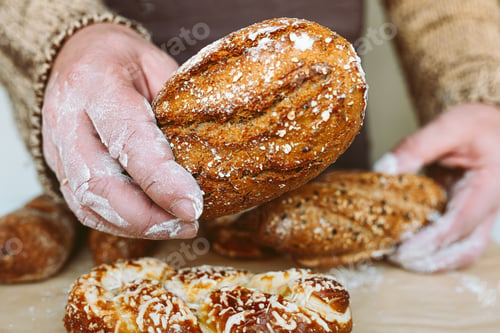 Preview: Baker's hands with bread