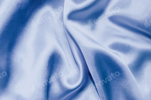 Preview: Shot of the shiny Maya blue silk satin background in waves