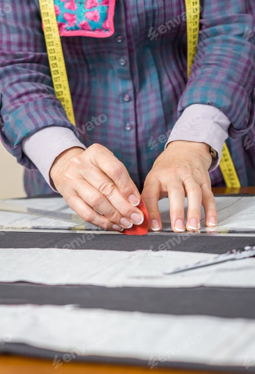 Preview: Dressmaker design tailor pattern on the table
