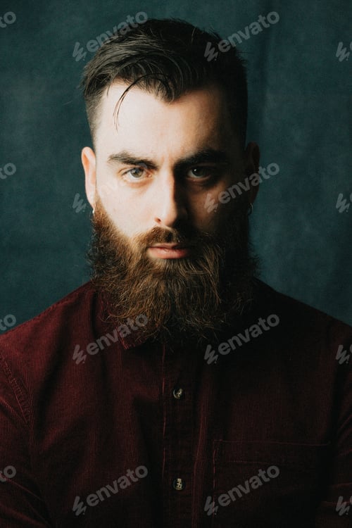 Preview: Portrait of a handsome bearded man, hipster style, serious, colorful, beauty and style concepts