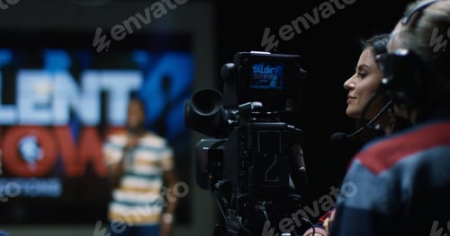 Preview: Medium Shot Of The Cameraman Shoots A Young Talent Who Sings On The Casting Of A Vocal Tv Show.