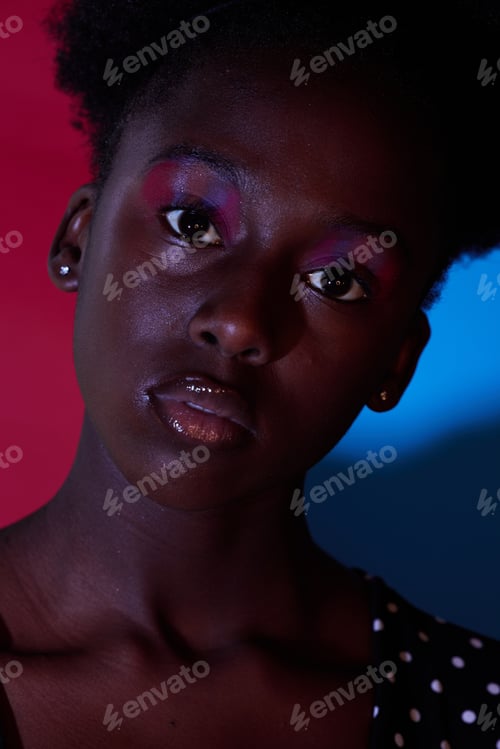 Preview: Trendy, aesthetic and portrait of black woman in dark color lighting isolated on a studio backgroun