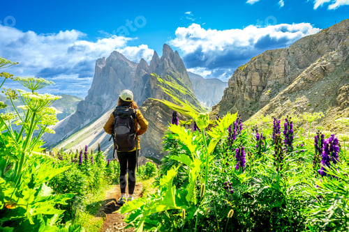 Preview: Tourist enjoying the odle and seceda mountains in the dolomites in summer